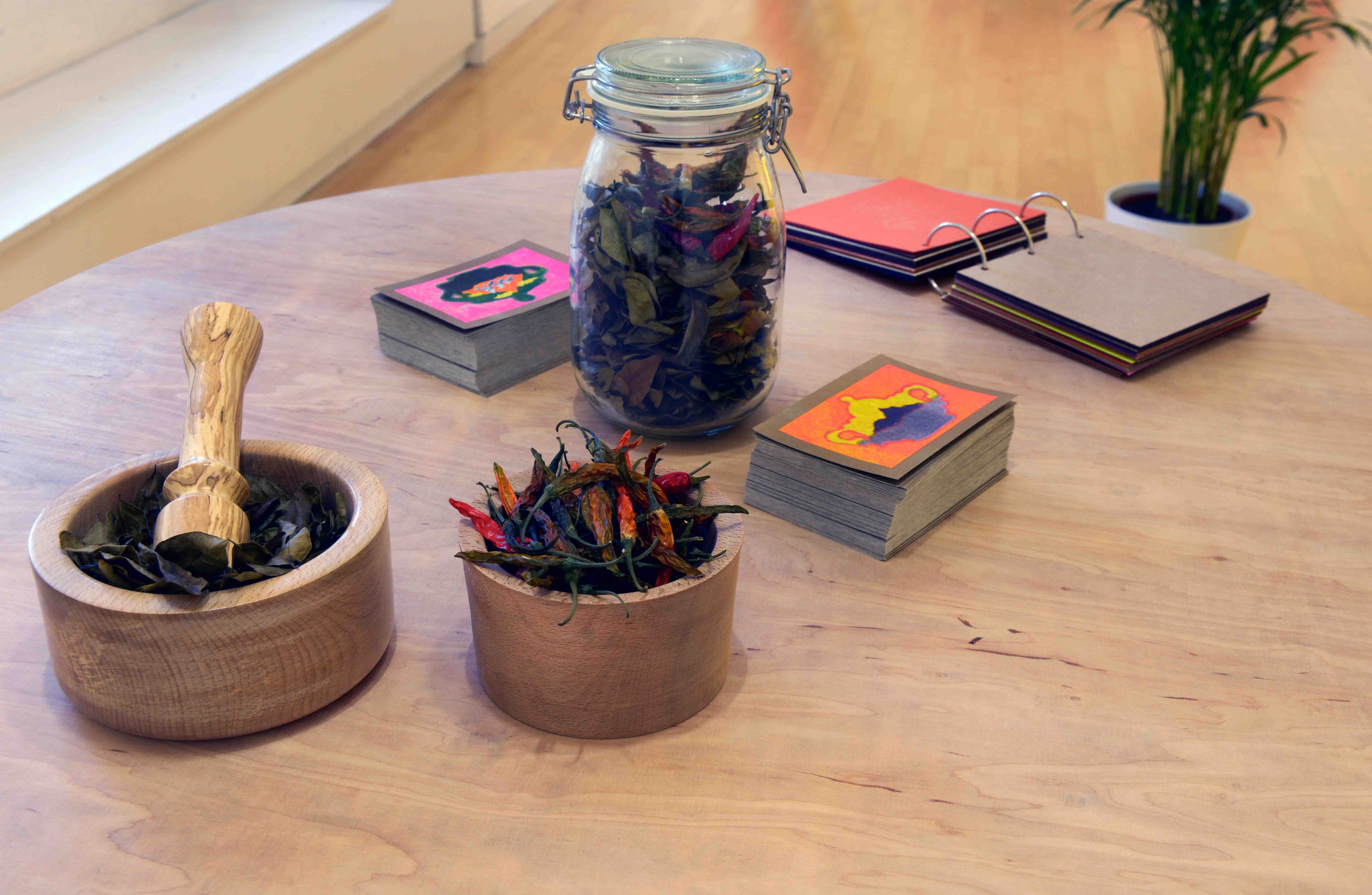 Dépi Nou Pié Zamblak, 2023, woodcut, book, wooden bowls, table. Installation view (Photo by Alan Dimmick)